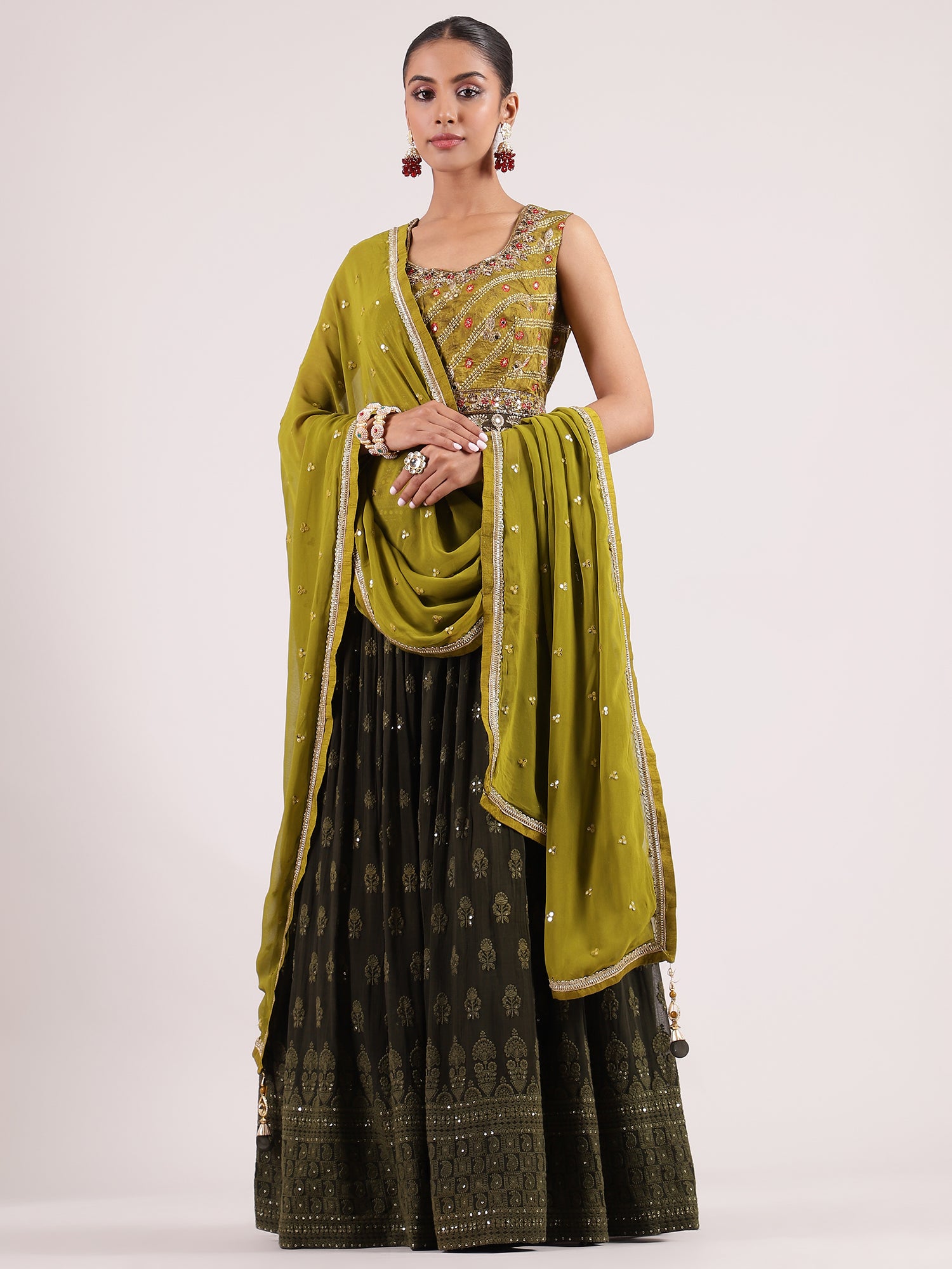 Radiant Bottle Green Georgette Lehenga with Mirror Work & Embroidered Blouse