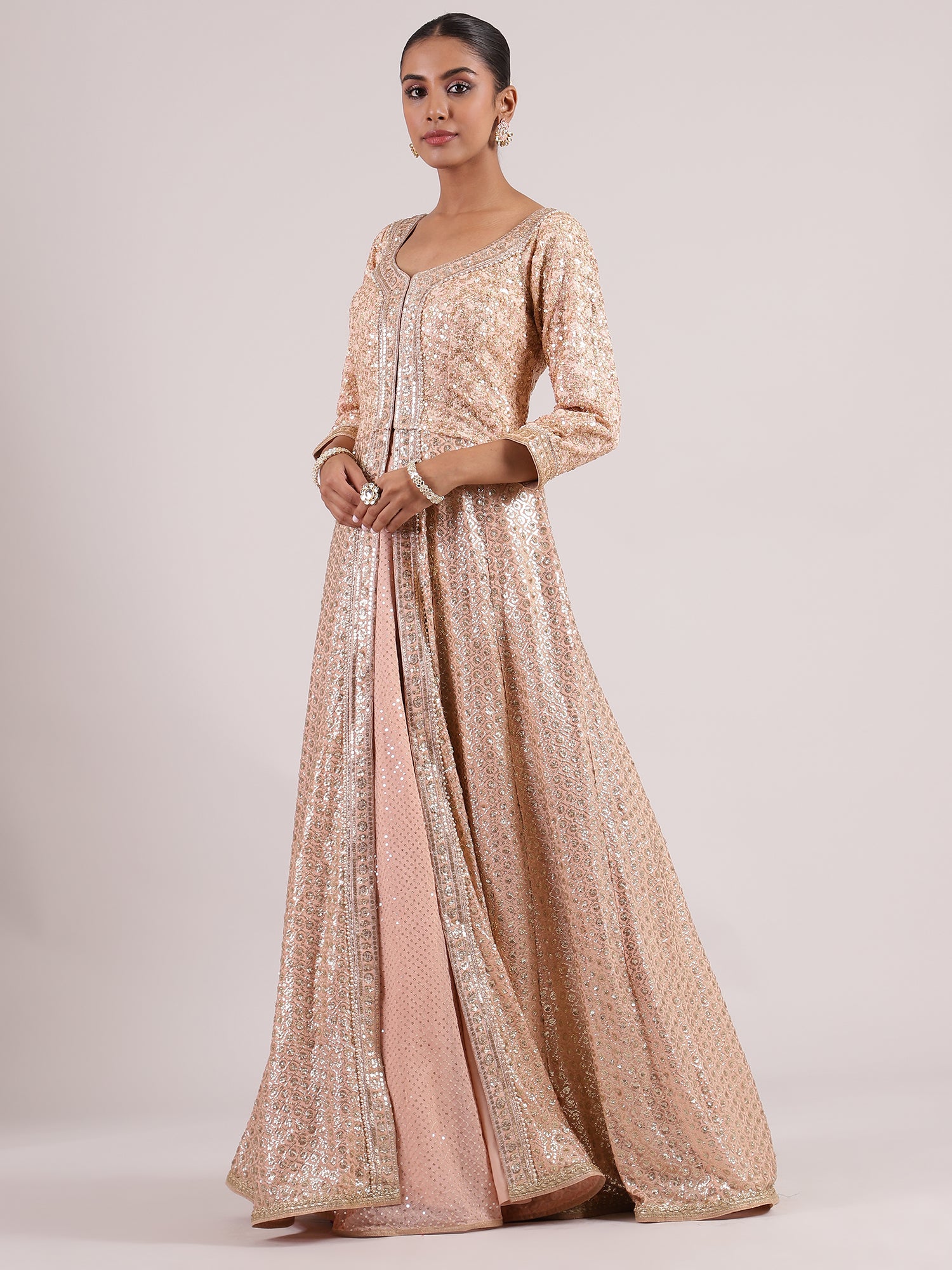 Exquisite Rose Gold Mastani Lehenga with All-Over Sequin & Embroidery Work