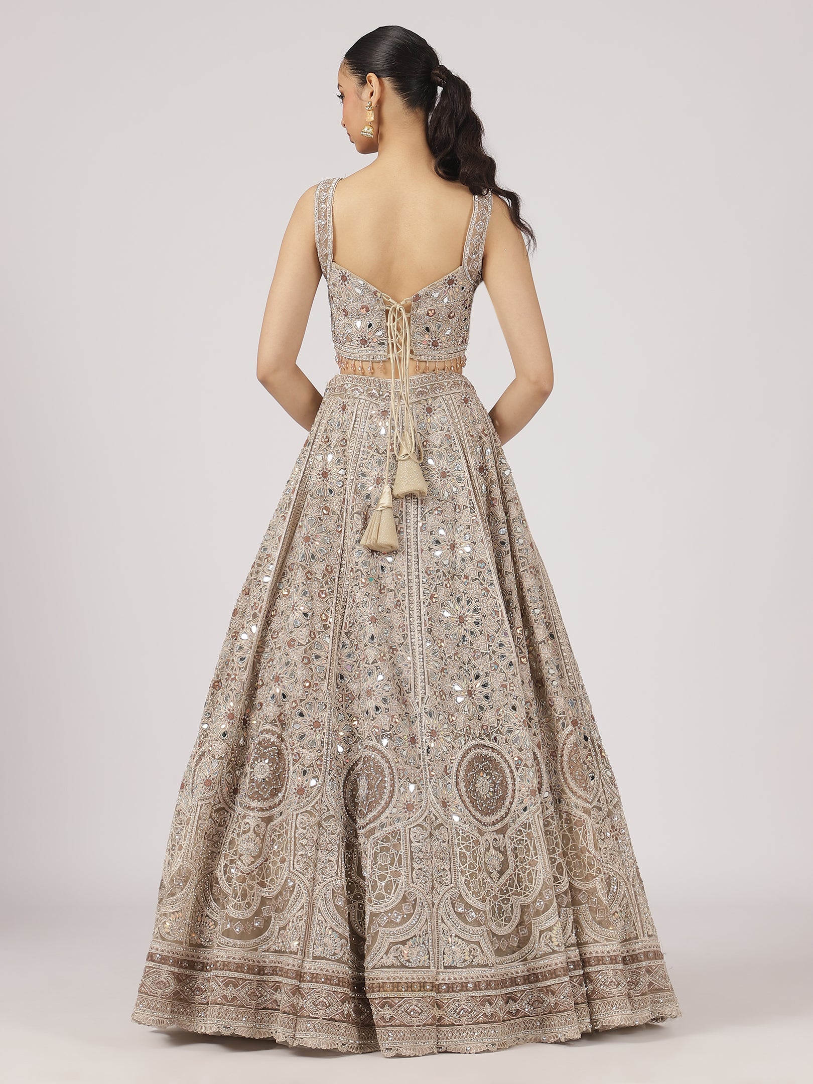 Elegant Beige Netted Lehenga with Intricate Mirror Work Blouse & Skirt