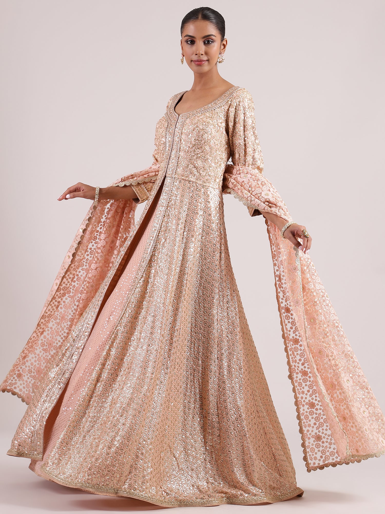 Exquisite Rose Gold Mastani Lehenga with All-Over Sequin & Embroidery Work