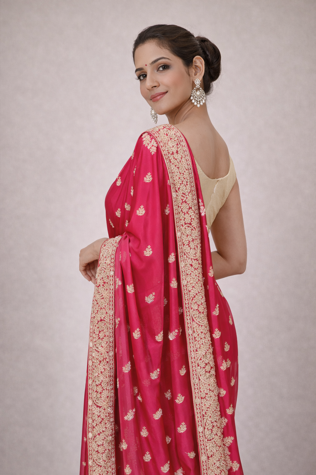 Rani Pink Designer Saree with Heavy Gold Embroidery Border