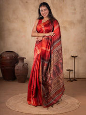 Full-length view of a maroon tussar silk saree with red and orange checks and an ornate pallu