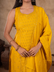 Close-up of a sleeveless yellow cotton kurta with sequin-embroidered yoke and dupatta