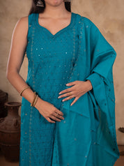 Close-up of the embellished sweetheart neckline on a Rama teal cotton kurta