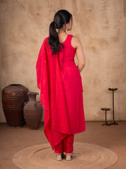 Back view of a Rani pink cotton salwar suit with the dupatta draped across the back