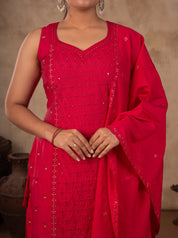 Close-up of the sleeveless Rani pink cotton kurta with an embroidered sweetheart neckline and dupatta