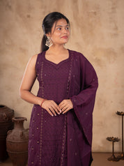 Half-length view of a sleeveless purple cotton kurta with sequin detailing and matching dupatta