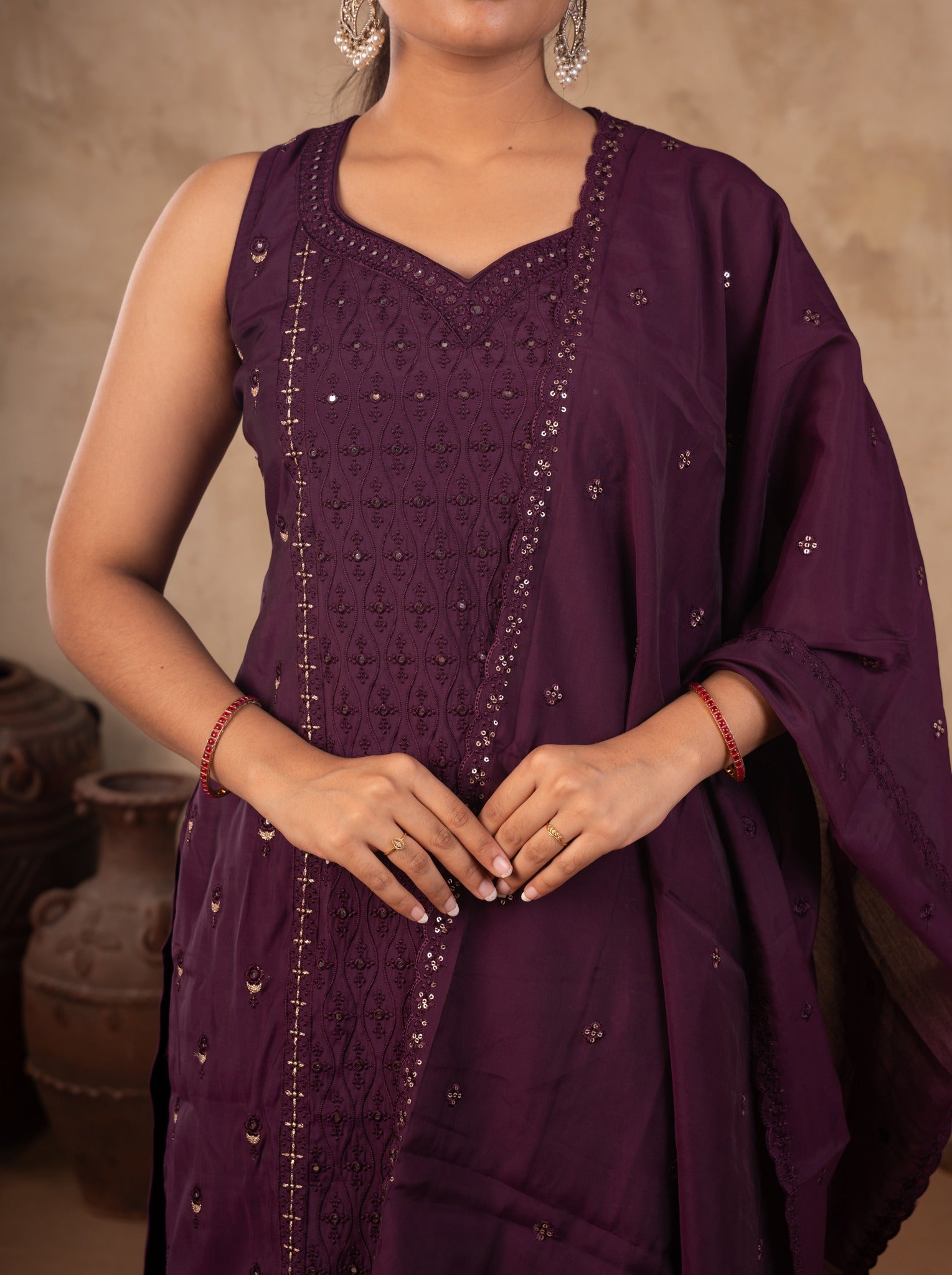 Close-up of the sleeveless purple cotton kurta with sequin embroidery and the dupatta draped over the shoulder