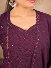 Detail of the sweetheart neckline with sequin and thread embroidery on the purple cotton kurta