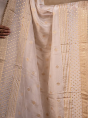 Detail of the woven gold border and motifs on the white silk dupatta