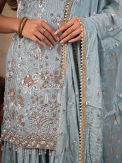 Close-up of the floral sequin embroidery on a sage green georgette kurta and dupatta trim