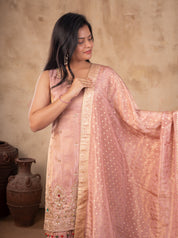 Model holding the blush pink dupatta out to the side, showing the embroidered kurta