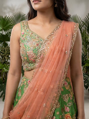 Green Raw Silk Lehenga with Mirror Work & Peach Net Dupatta