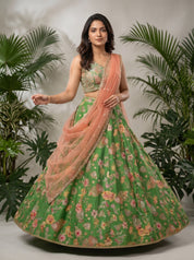Green Raw Silk Lehenga with Mirror Work & Peach Net Dupatta