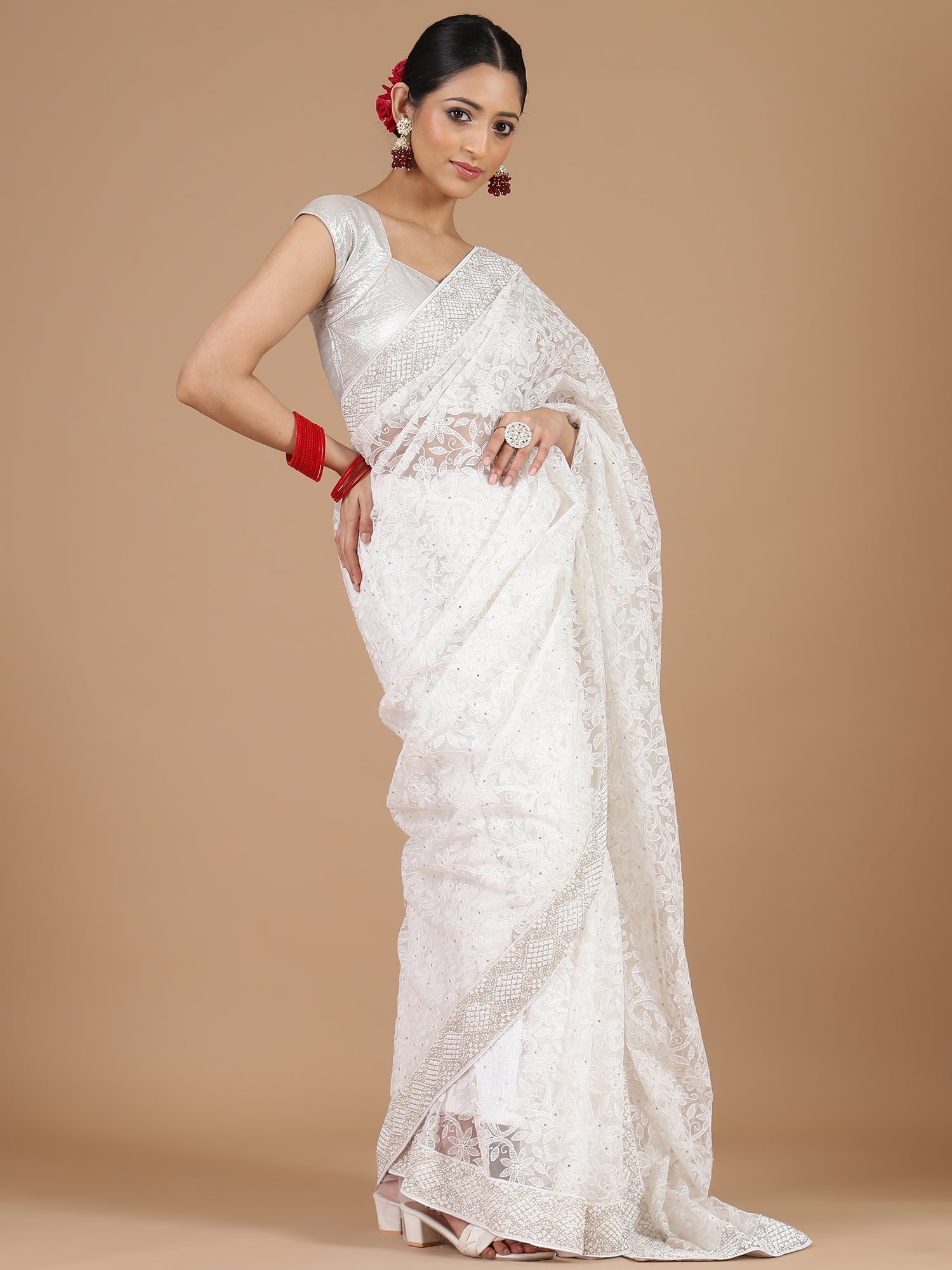 Half white net chikankari embroidered saree with unstitched blouse