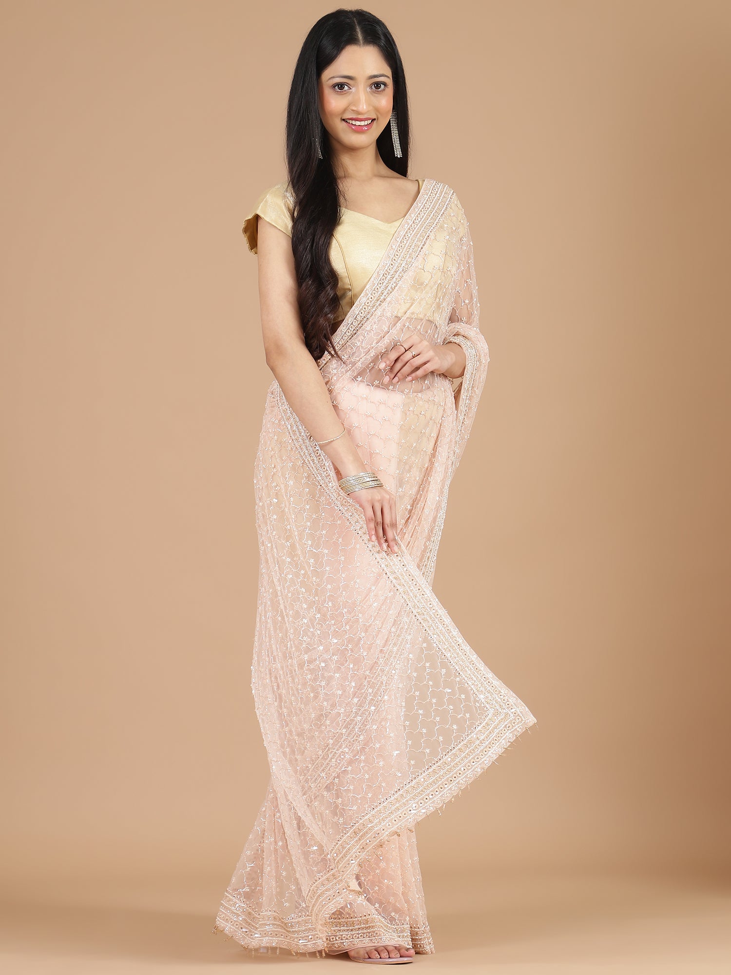 Light Peach Net Saree with Cutdana Embroidery