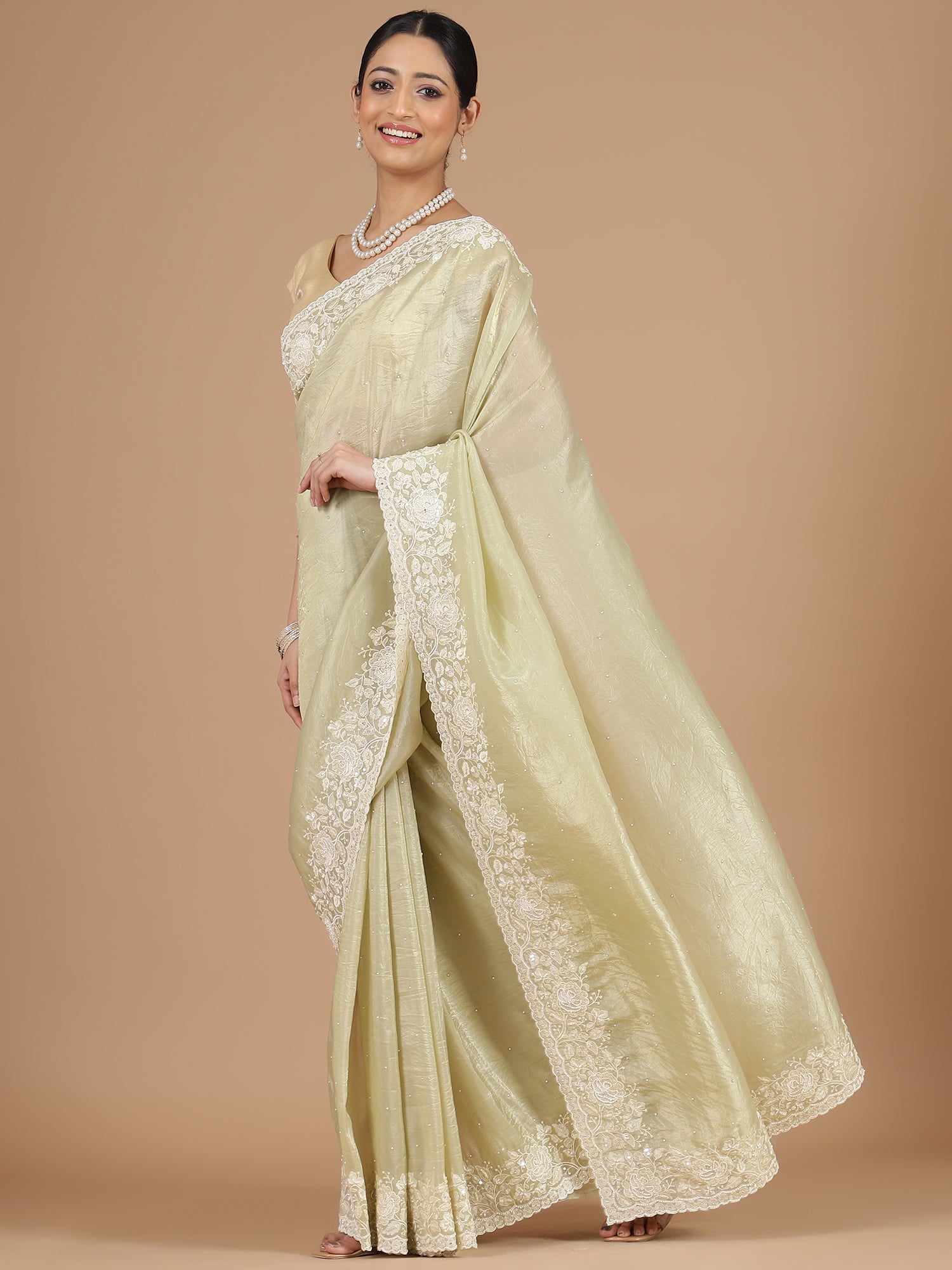 Light Green Crush Tissue Saree with Floral Border Embroidery