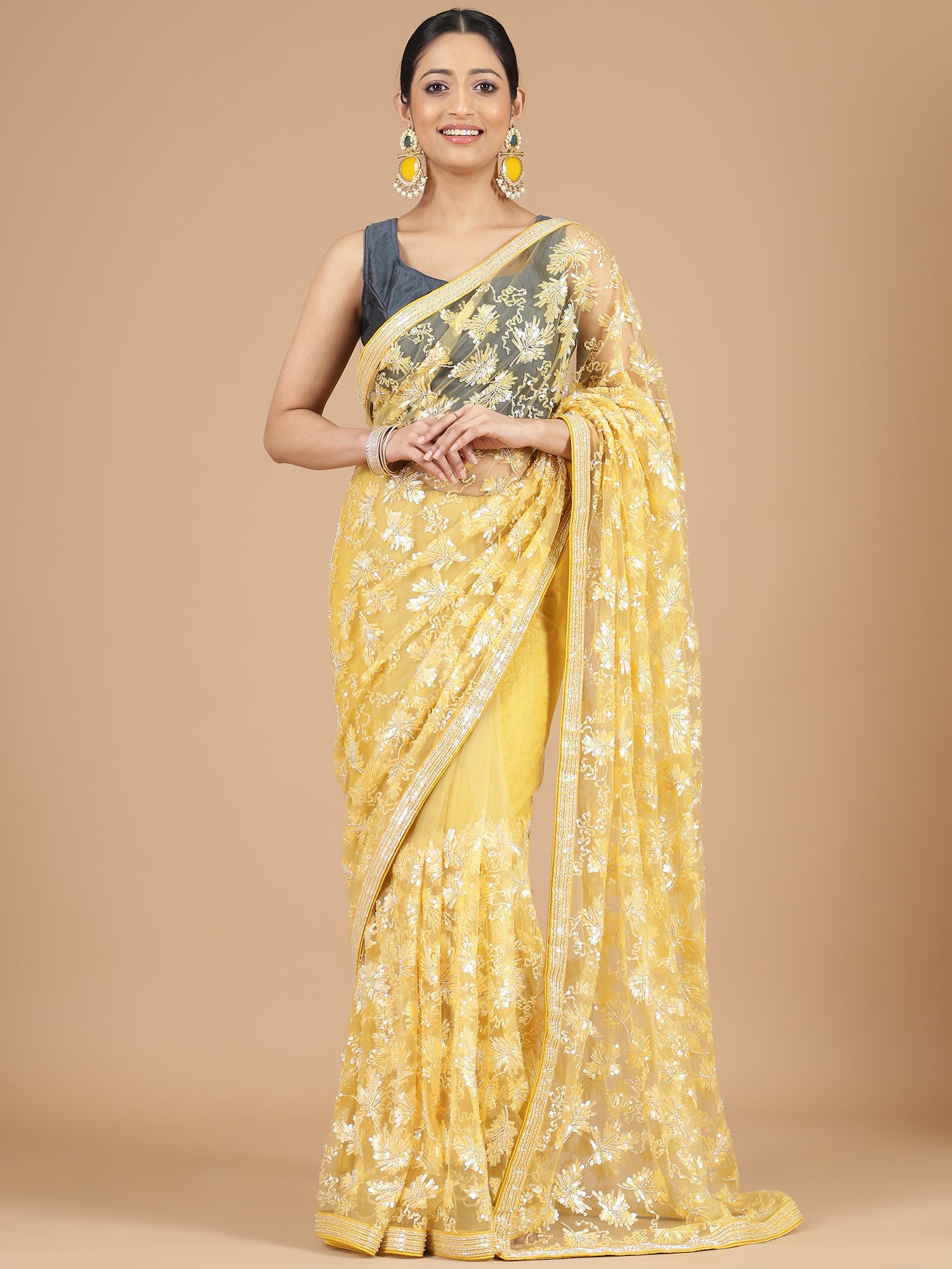 Yellow Netted Saree with Intricate Full Embroidery