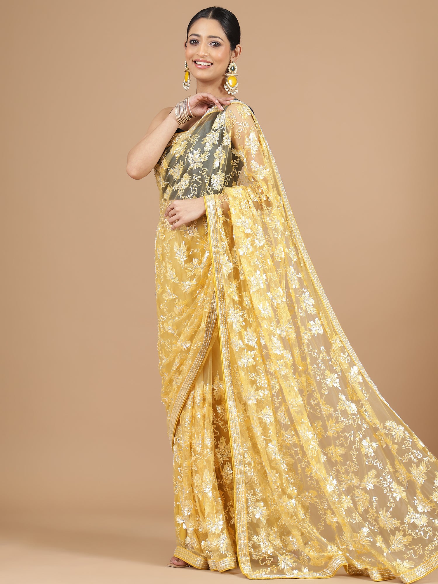 Yellow Netted Saree with Intricate Full Embroidery