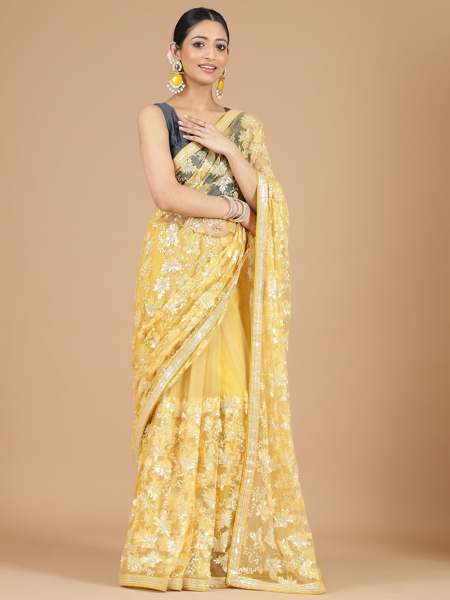 Yellow Netted Saree with Intricate Full Embroidery