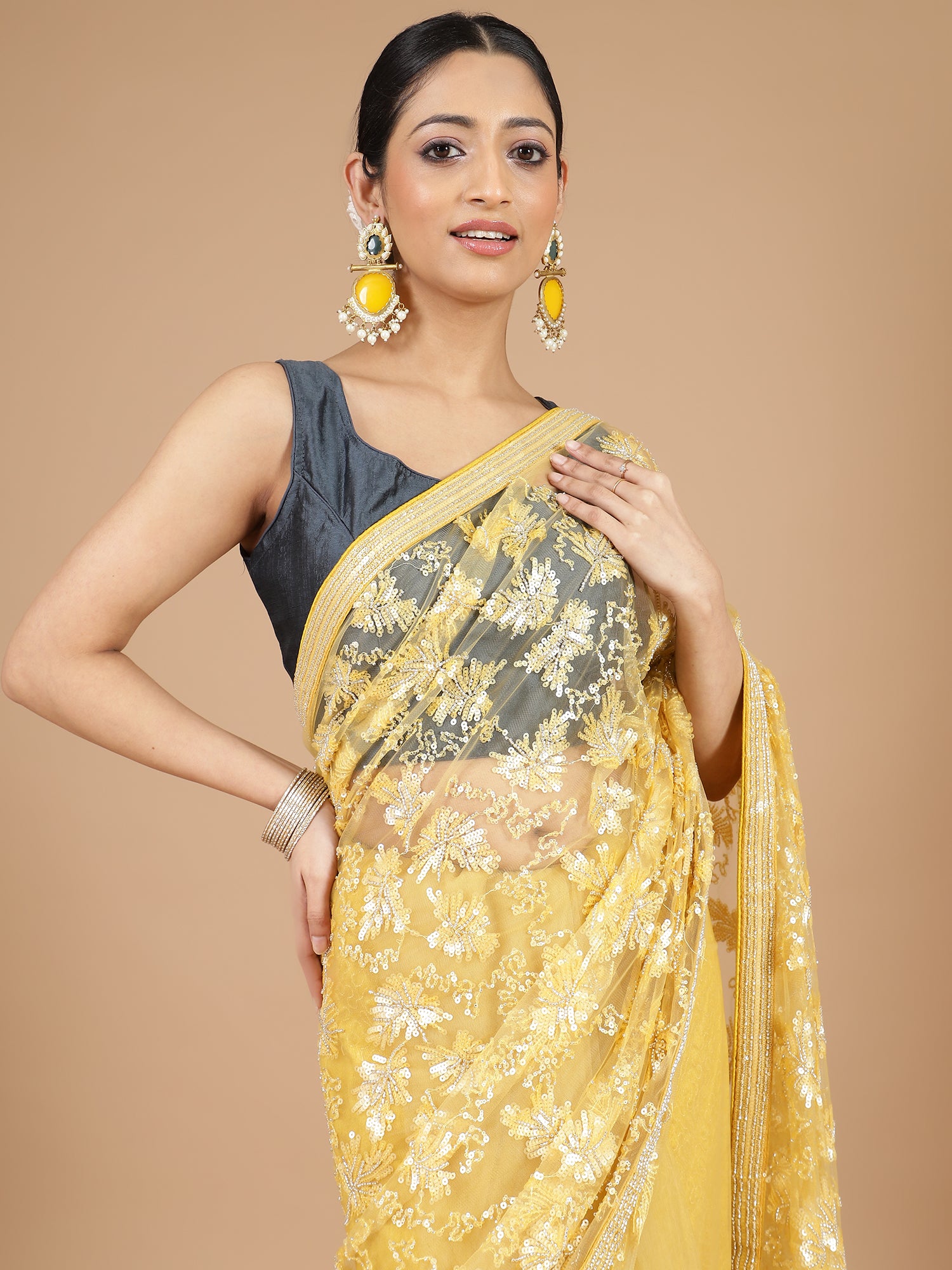 Yellow Netted Saree with Intricate Full Embroidery